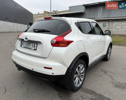 Белый Ниссан Жук, объемом двигателя 1.6 л и пробегом 64 тыс. км за 12700 $, фото 7 на Automoto.ua