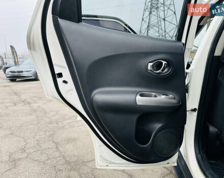 Белый Ниссан Жук, объемом двигателя 1.57 л и пробегом 106 тыс. км за 11500 $, фото 16 на Automoto.ua