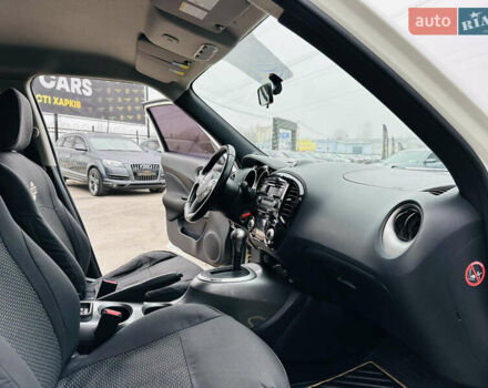 Белый Ниссан Жук, объемом двигателя 1.57 л и пробегом 106 тыс. км за 11500 $, фото 22 на Automoto.ua