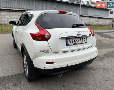 Белый Ниссан Жук, объемом двигателя 1.6 л и пробегом 64 тыс. км за 12700 $, фото 6 на Automoto.ua