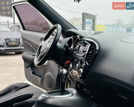 Белый Ниссан Жук, объемом двигателя 1.57 л и пробегом 106 тыс. км за 11500 $, фото 23 на Automoto.ua