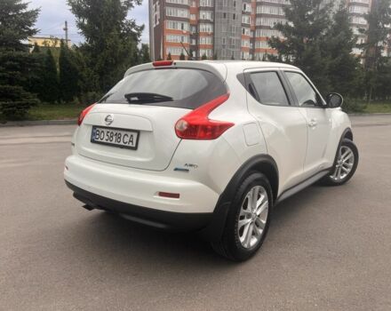 Белый Ниссан Жук, объемом двигателя 1.6 л и пробегом 144 тыс. км за 9000 $, фото 2 на Automoto.ua