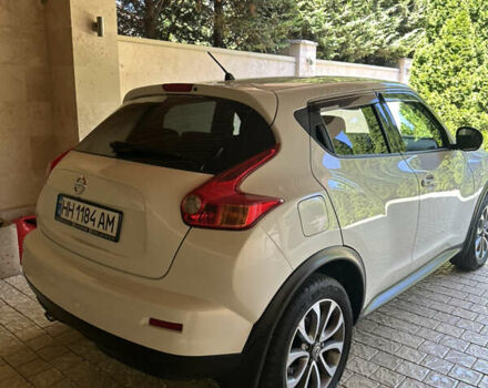 Белый Ниссан Жук, объемом двигателя 1.6 л и пробегом 50 тыс. км за 14500 $, фото 3 на Automoto.ua