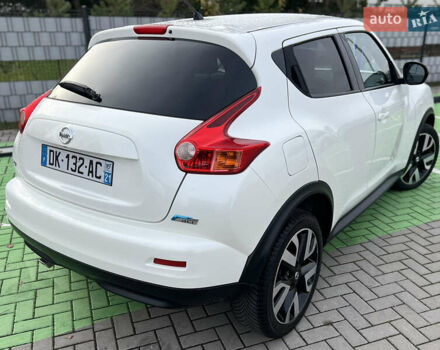 Белый Ниссан Жук, объемом двигателя 1.5 л и пробегом 240 тыс. км за 10950 $, фото 4 на Automoto.ua