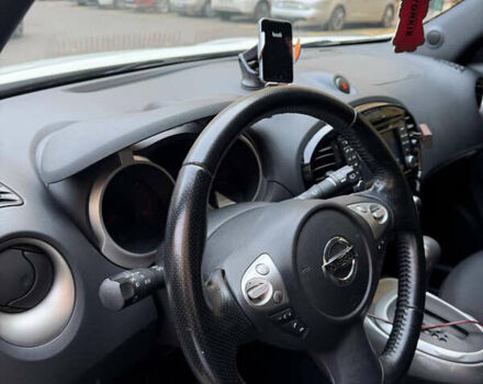 Белый Ниссан Жук, объемом двигателя 1.6 л и пробегом 130 тыс. км за 11600 $, фото 17 на Automoto.ua