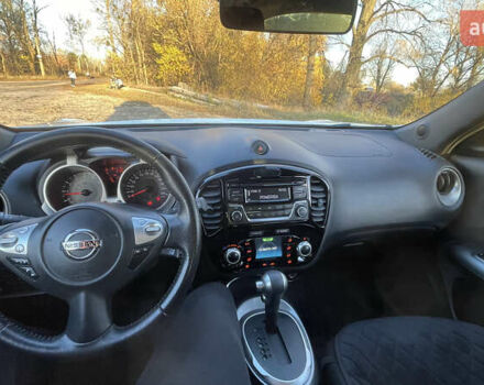 Белый Ниссан Жук, объемом двигателя 1.6 л и пробегом 81 тыс. км за 13200 $, фото 10 на Automoto.ua