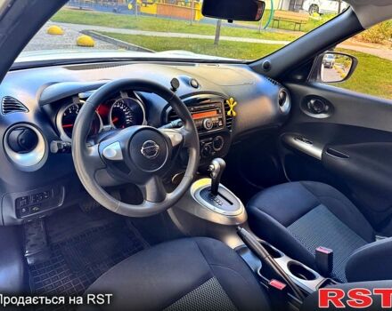 Белый Ниссан Жук, объемом двигателя 1.6 л и пробегом 65 тыс. км за 12000 $, фото 13 на Automoto.ua