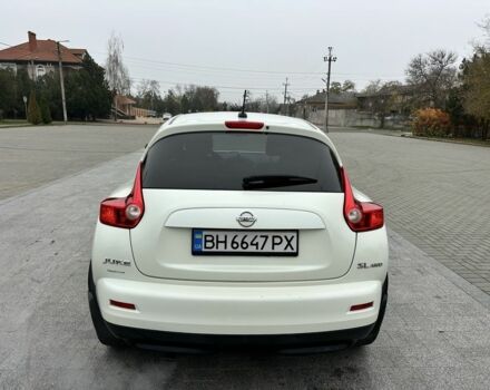 Белый Ниссан Жук, объемом двигателя 1.6 л и пробегом 165 тыс. км за 8900 $, фото 9 на Automoto.ua