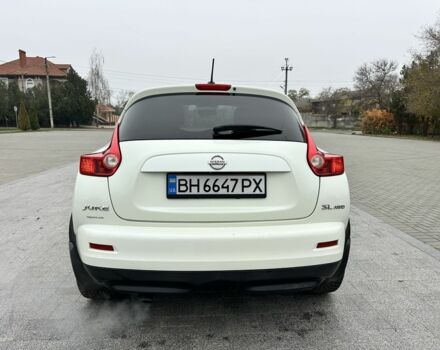 Белый Ниссан Жук, объемом двигателя 1.6 л и пробегом 165 тыс. км за 8900 $, фото 8 на Automoto.ua