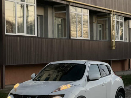 Белый Ниссан Жук, объемом двигателя 1.6 л и пробегом 77 тыс. км за 11500 $, фото 1 на Automoto.ua