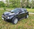 Черный Ниссан Жук, объемом двигателя 1.6 л и пробегом 150 тыс. км за 8000 $, фото 1 на Automoto.ua