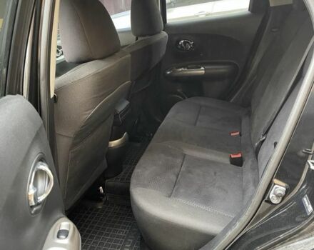 Черный Ниссан Жук, объемом двигателя 1.6 л и пробегом 276 тыс. км за 8900 $, фото 5 на Automoto.ua