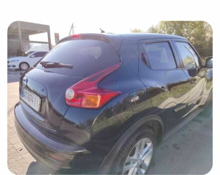 Черный Ниссан Жук, объемом двигателя 1.6 л и пробегом 300 тыс. км за 11517 $, фото 4 на Automoto.ua