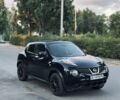 Черный Ниссан Жук, объемом двигателя 1.6 л и пробегом 193 тыс. км за 11000 $, фото 1 на Automoto.ua