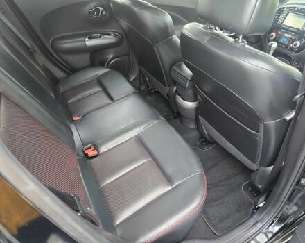 Черный Ниссан Жук, объемом двигателя 1.6 л и пробегом 72 тыс. км за 8900 $, фото 12 на Automoto.ua