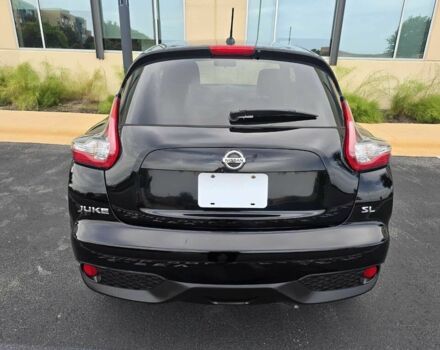 Черный Ниссан Жук, объемом двигателя 1.6 л и пробегом 72 тыс. км за 8900 $, фото 4 на Automoto.ua