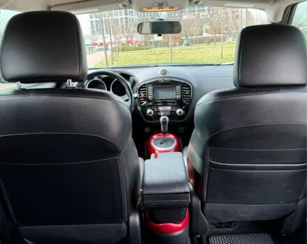 Черный Ниссан Жук, объемом двигателя 1.6 л и пробегом 65 тыс. км за 12000 $, фото 7 на Automoto.ua