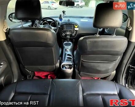 Черный Ниссан Жук, объемом двигателя 1.6 л и пробегом 347 тыс. км за 10300 $, фото 5 на Automoto.ua