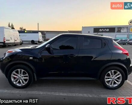 Черный Ниссан Жук, объемом двигателя 1.6 л и пробегом 347 тыс. км за 10300 $, фото 7 на Automoto.ua