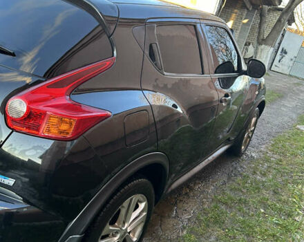 Черный Ниссан Жук, объемом двигателя 1.46 л и пробегом 158 тыс. км за 8250 $, фото 2 на Automoto.ua