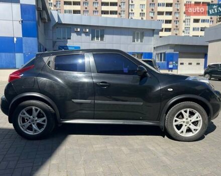 Черный Ниссан Жук, объемом двигателя 1.6 л и пробегом 115 тыс. км за 10030 $, фото 4 на Automoto.ua