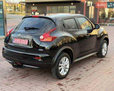 Черный Ниссан Жук, объемом двигателя 1.5 л и пробегом 184 тыс. км за 8900 $, фото 3 на Automoto.ua