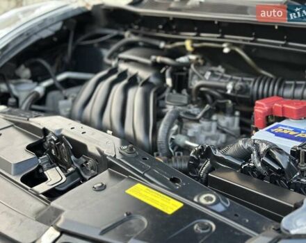 Черный Ниссан Жук, объемом двигателя 1.6 л и пробегом 117 тыс. км за 9900 $, фото 86 на Automoto.ua