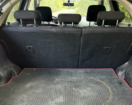 Черный Ниссан Жук, объемом двигателя 1.46 л и пробегом 160 тыс. км за 7550 $, фото 9 на Automoto.ua