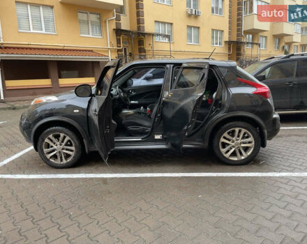 Черный Ниссан Жук, объемом двигателя 1.6 л и пробегом 270 тыс. км за 8500 $, фото 10 на Automoto.ua