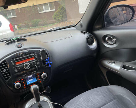 Черный Ниссан Жук, объемом двигателя 1.6 л и пробегом 270 тыс. км за 8500 $, фото 8 на Automoto.ua