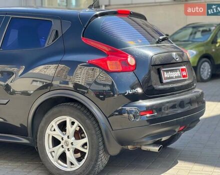 Черный Ниссан Жук, объемом двигателя 1.6 л и пробегом 115 тыс. км за 10030 $, фото 9 на Automoto.ua