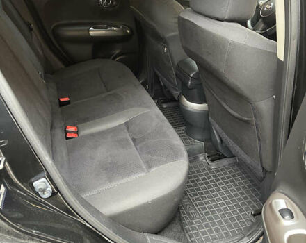 Черный Ниссан Жук, объемом двигателя 1.6 л и пробегом 270 тыс. км за 8500 $, фото 6 на Automoto.ua