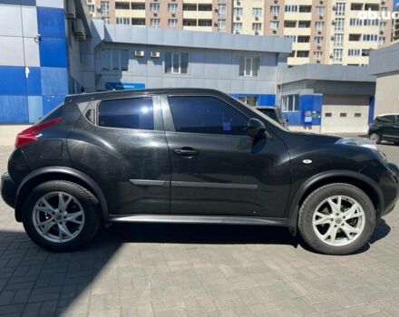 Черный Ниссан Жук, объемом двигателя 1.6 л и пробегом 115 тыс. км за 10030 $, фото 6 на Automoto.ua