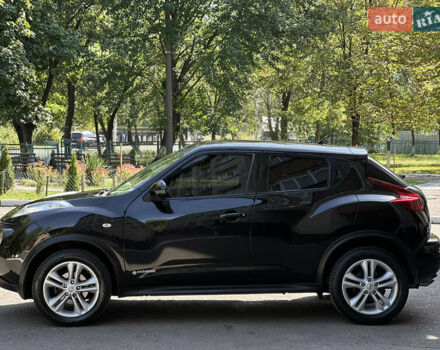 Черный Ниссан Жук, объемом двигателя 1.5 л и пробегом 229 тыс. км за 7800 $, фото 5 на Automoto.ua