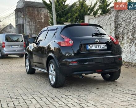 Черный Ниссан Жук, объемом двигателя 1.6 л и пробегом 117 тыс. км за 9900 $, фото 20 на Automoto.ua