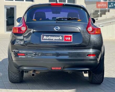 Черный Ниссан Жук, объемом двигателя 1.6 л и пробегом 115 тыс. км за 10030 $, фото 7 на Automoto.ua