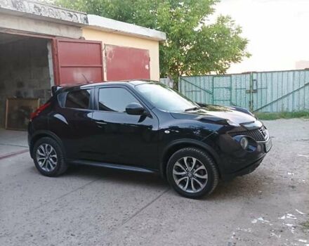 Черный Ниссан Жук, объемом двигателя 1.6 л и пробегом 160 тыс. км за 9300 $, фото 8 на Automoto.ua