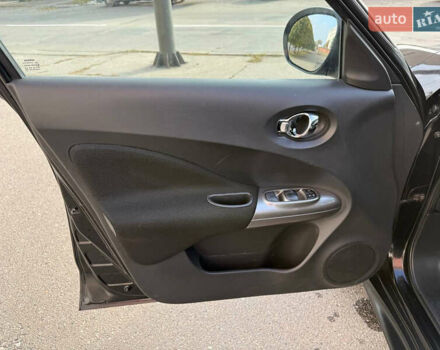 Черный Ниссан Жук, объемом двигателя 1.6 л и пробегом 187 тыс. км за 7900 $, фото 12 на Automoto.ua