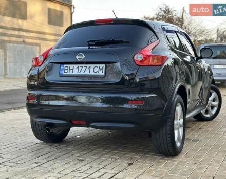 Черный Ниссан Жук, объемом двигателя 1.6 л и пробегом 117 тыс. км за 9900 $, фото 7 на Automoto.ua