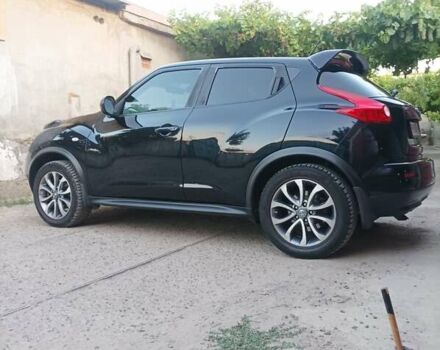 Черный Ниссан Жук, объемом двигателя 1.6 л и пробегом 160 тыс. км за 9300 $, фото 7 на Automoto.ua