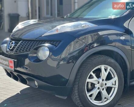 Черный Ниссан Жук, объемом двигателя 1.6 л и пробегом 115 тыс. км за 10030 $, фото 12 на Automoto.ua