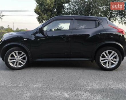 Черный Ниссан Жук, объемом двигателя 1.6 л и пробегом 153 тыс. км за 9500 $, фото 1 на Automoto.ua