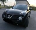 Черный Ниссан Жук, объемом двигателя 1.6 л и пробегом 153 тыс. км за 9500 $, фото 1 на Automoto.ua