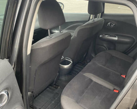 Черный Ниссан Жук, объемом двигателя 1.6 л и пробегом 120 тыс. км за 8300 $, фото 7 на Automoto.ua