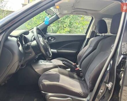 Черный Ниссан Жук, объемом двигателя 1.6 л и пробегом 151 тыс. км за 8998 $, фото 2 на Automoto.ua