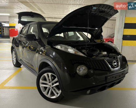 Черный Ниссан Жук, объемом двигателя 1.5 л и пробегом 250 тыс. км за 3950 $, фото 1 на Automoto.ua