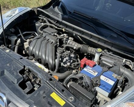 Черный Ниссан Жук, объемом двигателя 1.6 л и пробегом 128 тыс. км за 8800 $, фото 6 на Automoto.ua