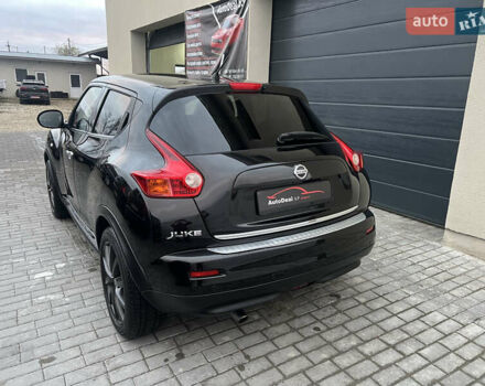 Черный Ниссан Жук, объемом двигателя 1.6 л и пробегом 190 тыс. км за 10850 $, фото 14 на Automoto.ua