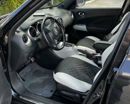 Черный Ниссан Жук, объемом двигателя 1.6 л и пробегом 115 тыс. км за 9900 $, фото 6 на Automoto.ua