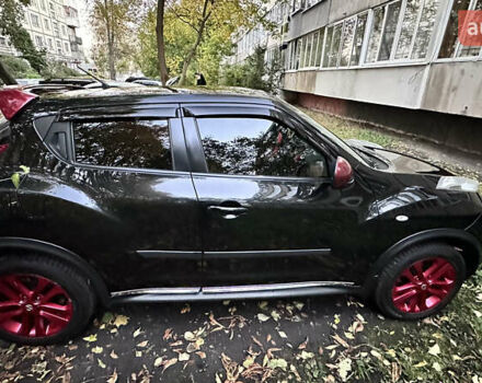 Черный Ниссан Жук, объемом двигателя 1.6 л и пробегом 102 тыс. км за 10999 $, фото 6 на Automoto.ua